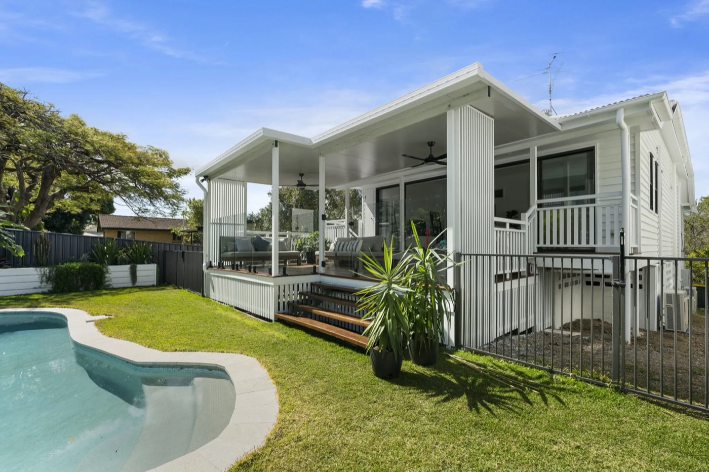A finished home and pool at Austin St by Tom Clifford Builders